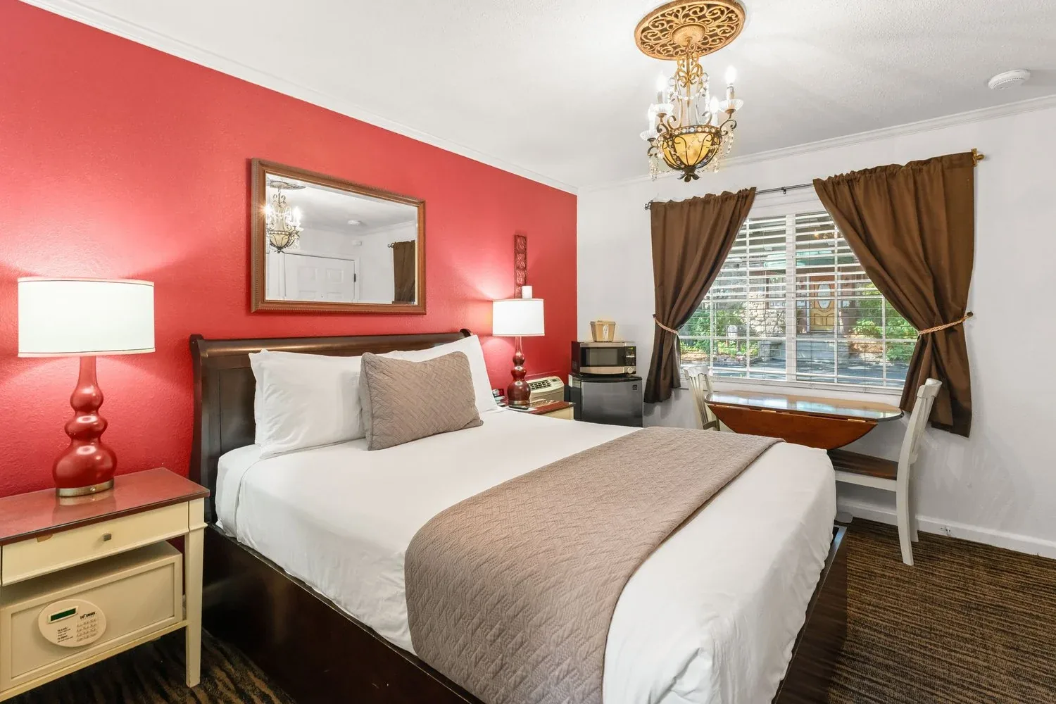 Queen Suite with a red accent wall